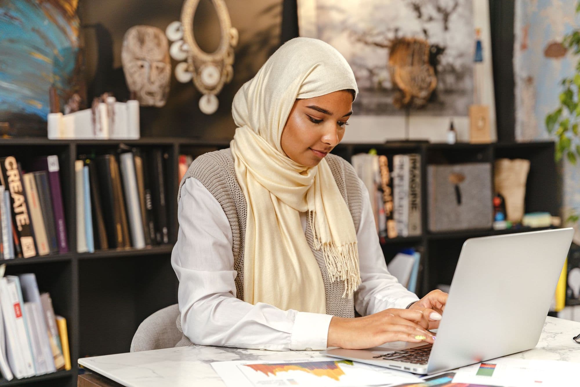 A founder working at her desk
