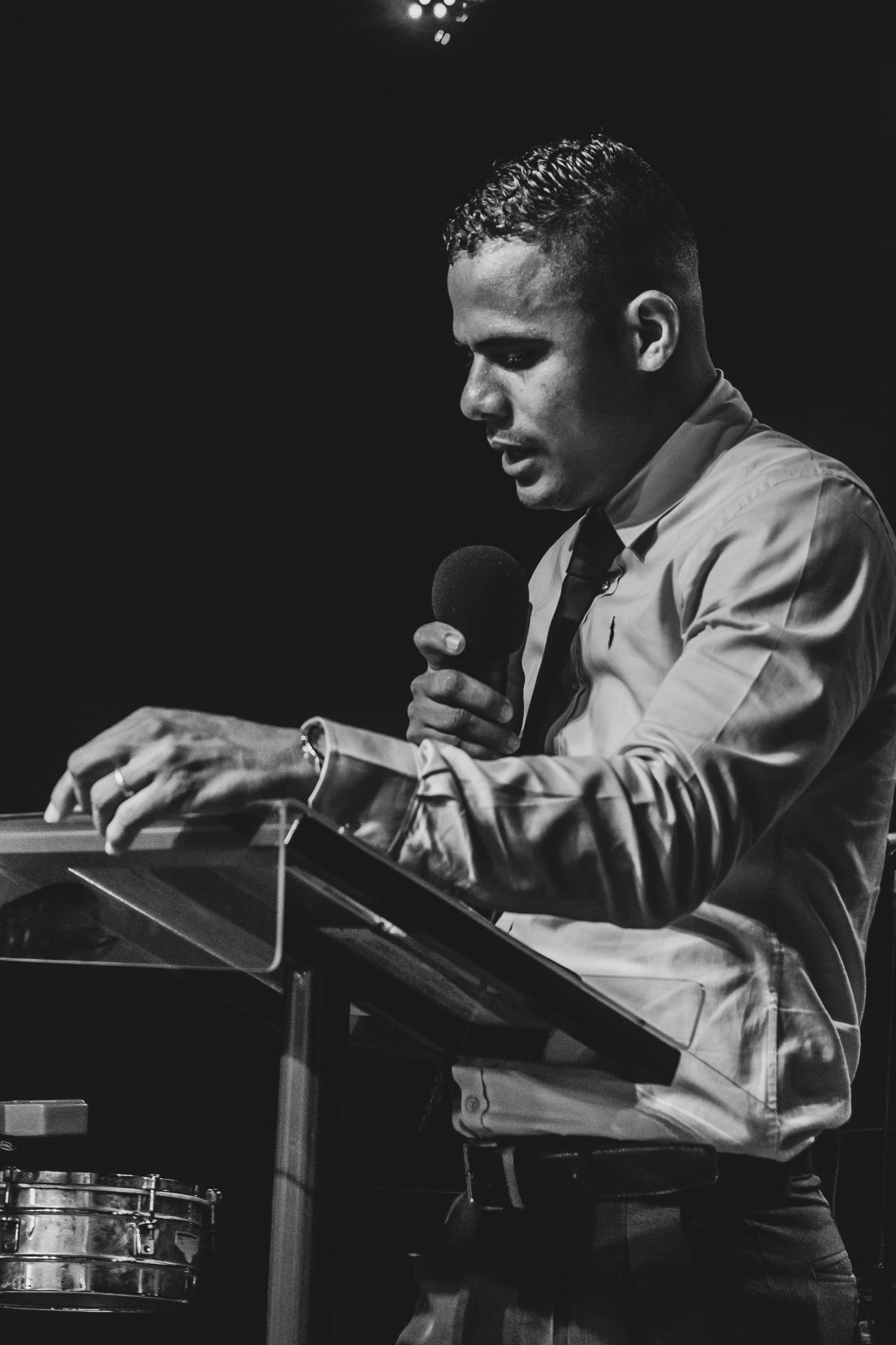 A founder speaking at a lectern